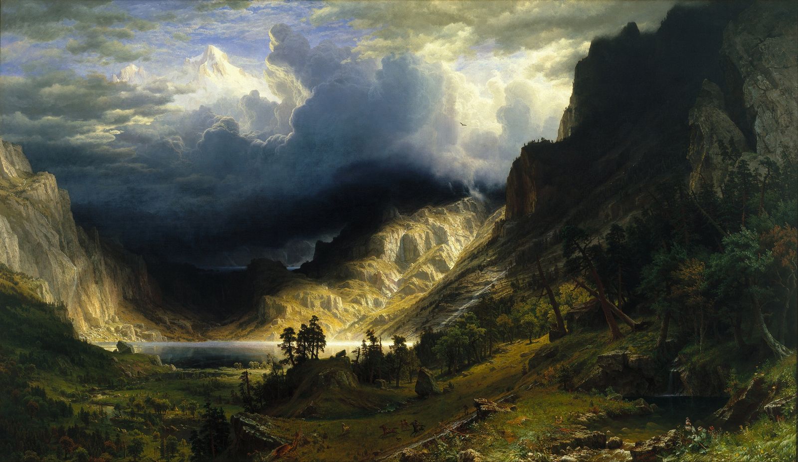 A storm breaking over a mountain valley: black cloud over a lit rock wall, a pale lake below, riders crossing the meadow in the foreground. Albert Bierstadt, 1866.